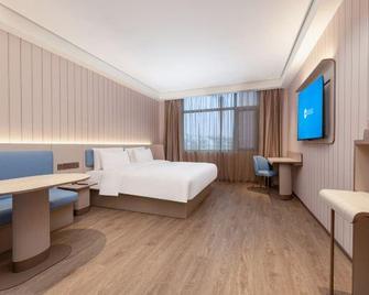 Hanting Hotel Mingguang Runxi City Square - Čchu-čou - Ložnice