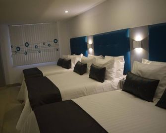 Hotel Dibeni Pereira - Pereira - Bedroom