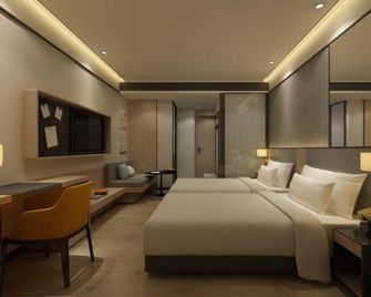 Modern Hotel - Ürümqi - Slaapkamer