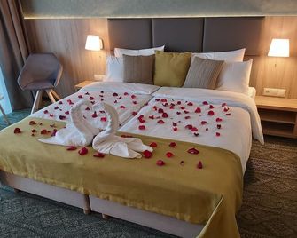 Lignum Hotel - מישקלוץ - חדר שינה