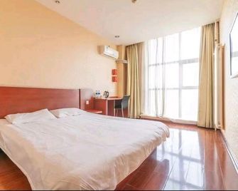 Kaihao Business Hotel - Тіанджін - Спальня