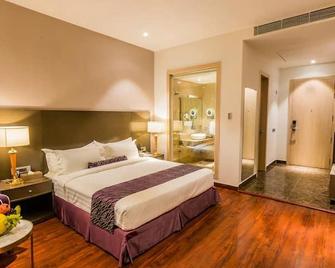 Amara Gateway Hotel - Morādābād - Schlafzimmer