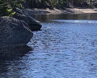 Cozy, Off-Grid Camp on Spectacle Pond w/ private water frontage! - Ellsworth - Beach