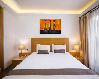 MB City Hotel - Izmir - Schlafzimmer