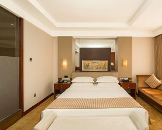 Tianjin Binhai New Area Second Street Baiyun Hotel - Tianjin - Slaapkamer