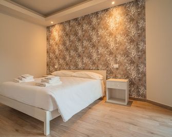 Le Alpi bed&living - Cividate Camuno - Slaapkamer