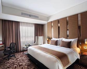 Swiss-Belinn Karawang - Karawang - Schlafzimmer