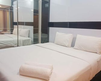 Simply 1Br at 31St Floor Vida View Makassar Apartment - Makassar - Bedroom