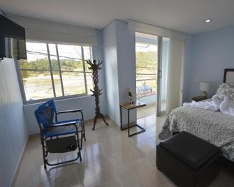 Hotel Brisas de Guatape - Guatapé - Schlafzimmer