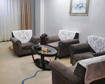 Dongming International Hotel - Heze - Спальня