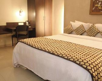 New Hotel Europa Inn - Rajkot - Quarto