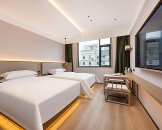 Jinshangju Oxygen Bath Hotel (Wanda Plaza Branch) - Shangqiu - Slaapkamer