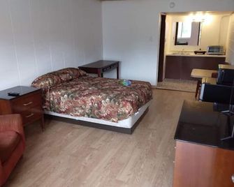 Saint Roberts Town and Village Motel - St Robert - Habitación
