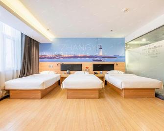 Zhangye Xilaishun Holiday Hotel (Railway Station No.1 Middle School) - Zhangye - Habitación