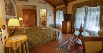 Romantic Hotel Furno - San Francesco al Campo - Schlafzimmer