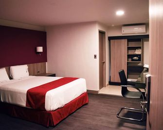 أوتل آتشي تي أولي - تيجوانا - غرفة نوم