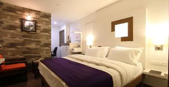 Hotel Casa - ואדודרה - חדר שינה