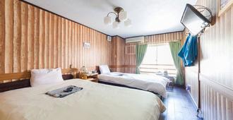 Hotel Villa Dogo - מאטסויאמה - חדר שינה