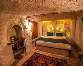 Cappadocia Nar Cave House & Swimming Pool - נבשאיר - חדר שינה