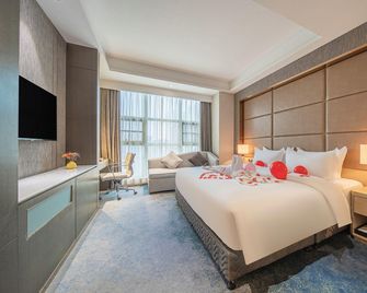 Shouzuo Wanyue Hotel - Qiandongnan - Bedroom