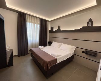 Palace Hotel Due Ponti - סיינה - חדר שינה