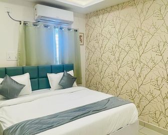 Hotel Vistaara Grand - Guntūr - Bedroom