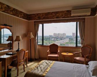 Dolphin Hotel - Qinzhou - Bedroom