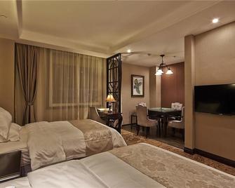 Jiuzhai Jiuyuan Hotel - 隴南 - 臥室