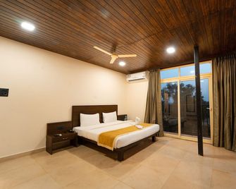 Kay's Riverview Resort - Near Baga Beach - Baga - Schlafzimmer