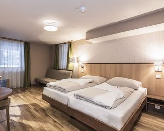 Hotel Jufa Grundlsee - Gössl - Schlafzimmer