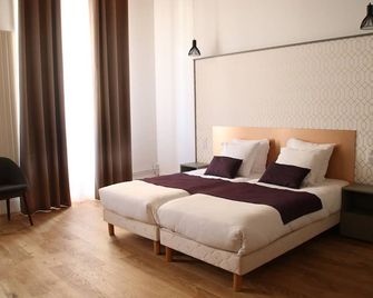 Hotel Saint Vincent - ליון - חדר שינה