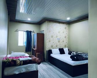 Hilsan Residency and Hotel - Bomdila - Bedroom