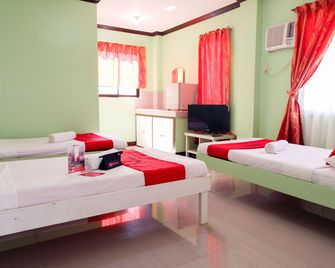 RedDoorz near Maribago Barangay Hall - Mactan - Phòng ngủ