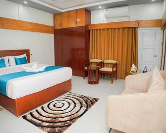 Spacious 5-bedroom bungalow in serene Sylhet with WiFi and AC - Sylhet - Bedroom