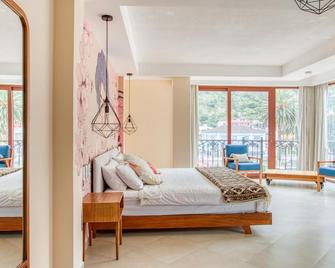 Hotel Brio Centro - Banos - חדר שינה