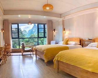 Yangshuo Xingping Li River Inn - Guilin - Bedroom