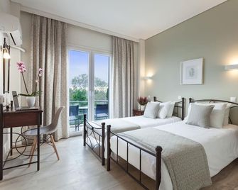 Minavra Hotel - Voúla - Schlafzimmer
