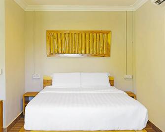 Capital O 90557 Dedsaan Beach Village - Kota Belud - Bedroom