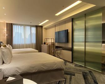 Monarch Plaza Hotel - Taoyuan City - חדר שינה