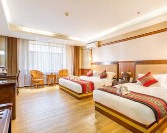Siam Hotel - Xishuangbanna - Bedroom
