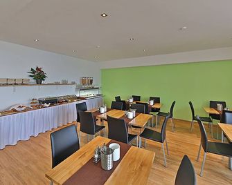 Montagehotel Business & City - Linz - Restaurante