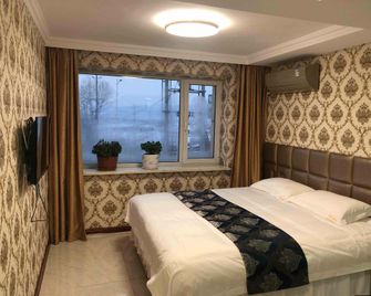 Hongrui Bathing Hotel - Фушунь - Спальня