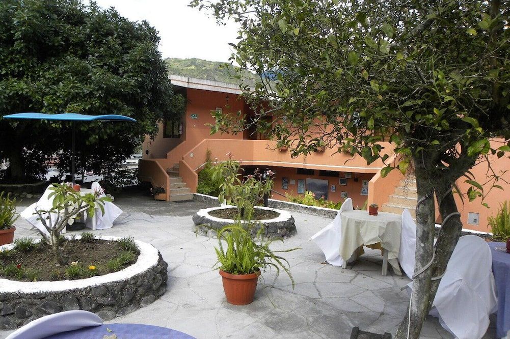 Hosteria Llanovientos - Banos - פטיו