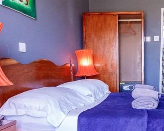Sea View Room | The Lodge Cape Point, Bakau - Bakau - Bedroom