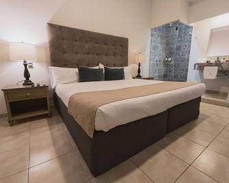 Artea Hotel Boutique - גוואדאלחארה - חדר שינה