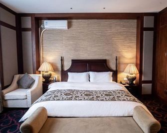 Rongchen International Holiday Hotel - Zhangjiakou - Camera da letto