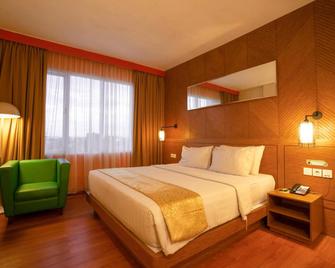 Maxonehotels At Vivo Palembang - Palembang - Habitación