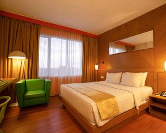 Maxonehotels At Vivo Palembang - Palembang - Yatak Odası