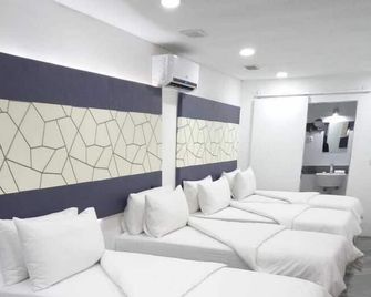 Jardim das Acácias - Maputo - Habitación