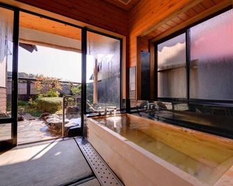 Nanaironoyu Hotel - Takeo - Ložnice